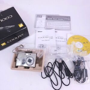 Nikon Coolpix L11 Digital Camera Silver 6.0MP 3x Zoom AA Battery Bundle w Box